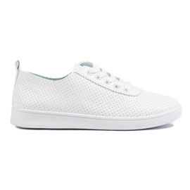 Zapatillas blancas clásicas de mujer. blanco
