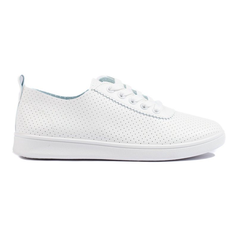 Zapatillas blancas clásicas de mujer. blanco