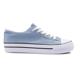 Deportivas clásicas con cordones de mujer azules.
