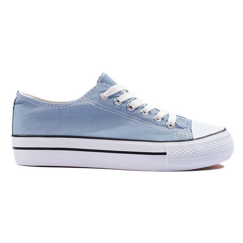 Deportivas clásicas con cordones de mujer azules.