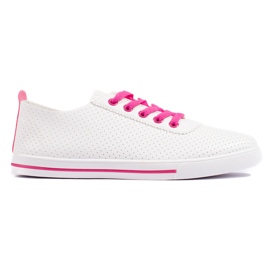 Zapatillas de mujer blancas con cordones rosas. blanco