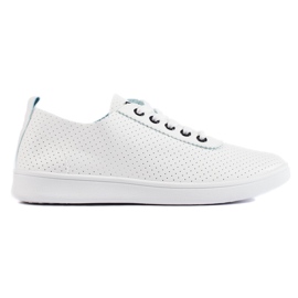 Zapatillas blancas clásicas de mujer. blanco