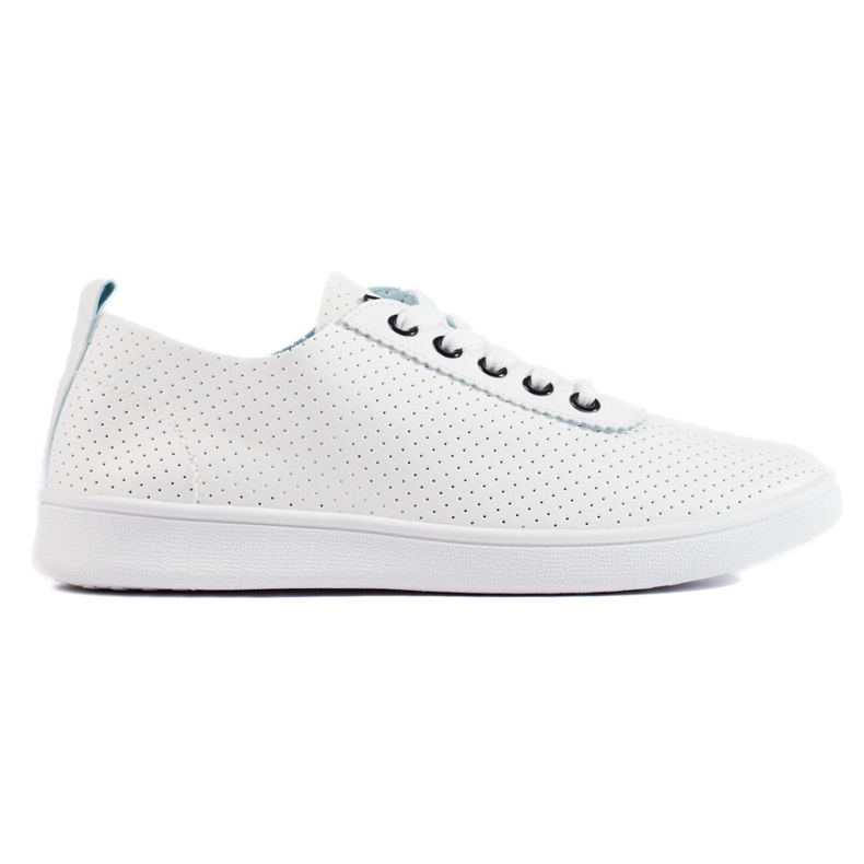 Zapatillas blancas clásicas de mujer. blanco