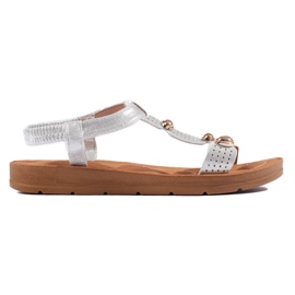 Sandalias de mujer plateadas con adornos. plata