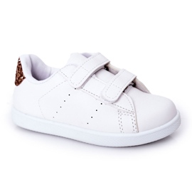 Zapatillas blancas y doradas para niños blanco