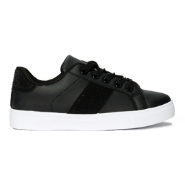 Zapatillas negras en la plataforma negro