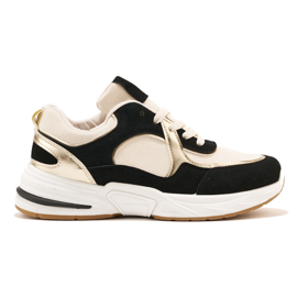 Zapatillas negras y beige con suela gruesa. blanco
