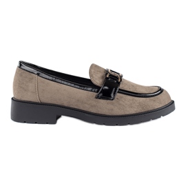 Mocasines de mujer en ante con hebilla. beige