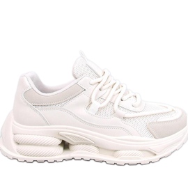 Zapatillas de mujer beige.
