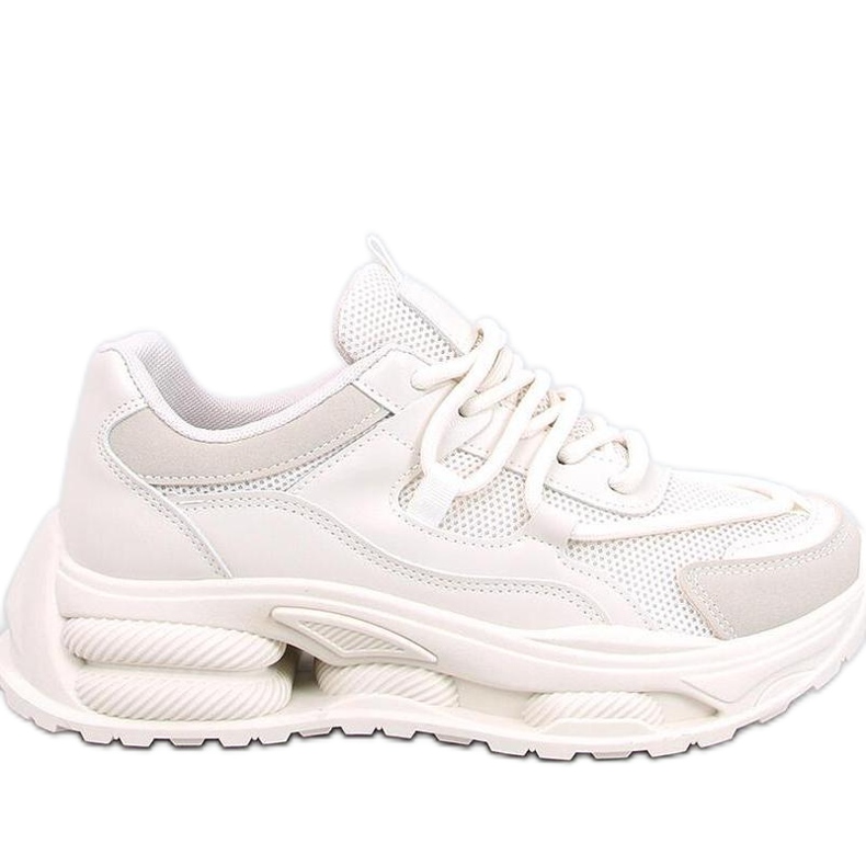 Zapatillas de mujer beige.