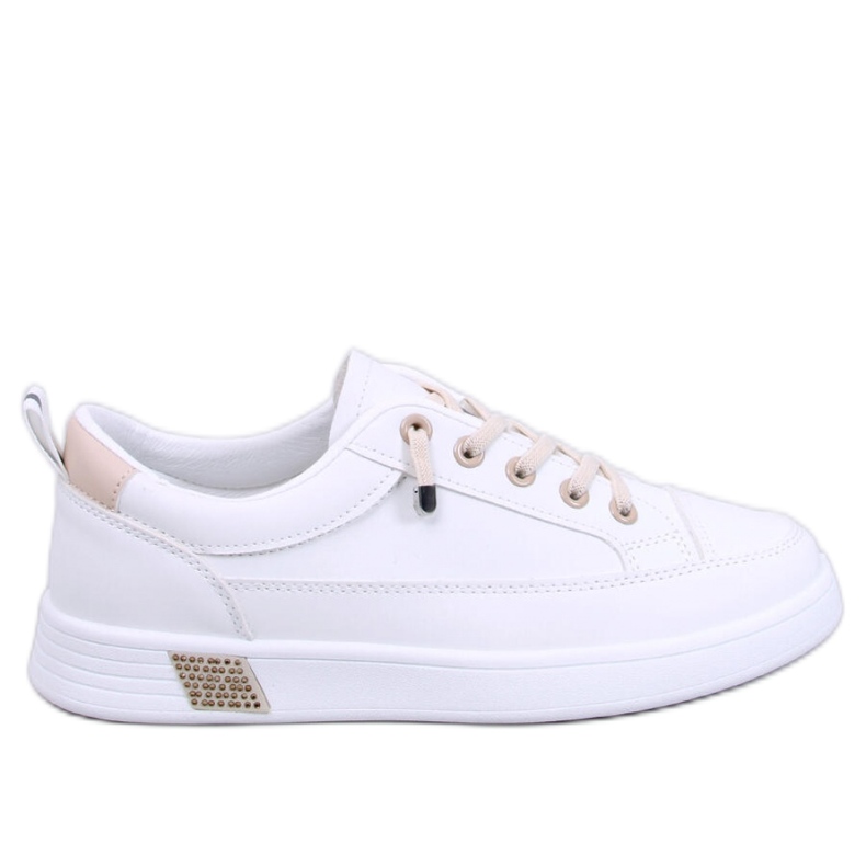 Zapatillas de mujer beige. blanco