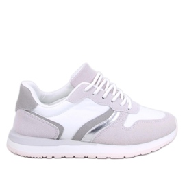 Zapatillas blancas de mujer. blanco