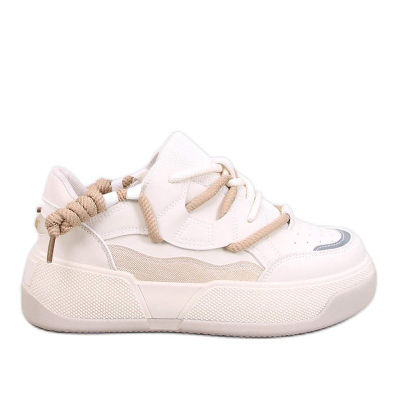Zapatillas de mujer beige.