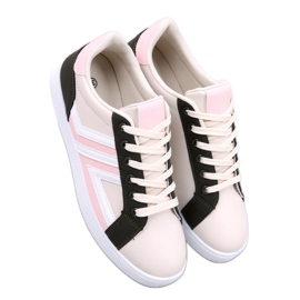 Zapatillas rosas de mujer. rosado