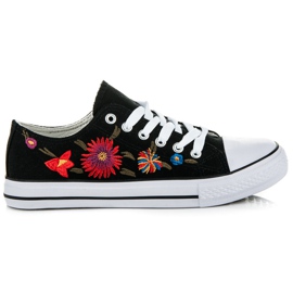 Deportivas con cordones y parches negro