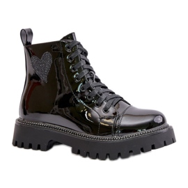 Elegantes botines de charol con parte superior baja y cremallera. negro