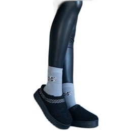 Botas de nieve de plataforma negras con parte superior baja y un patrón Greene bordado negro