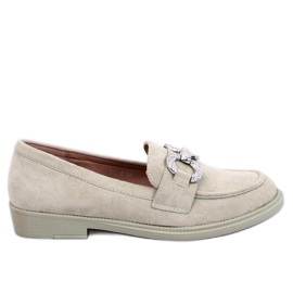 Mocasines clásicos de ante con decoración verde.