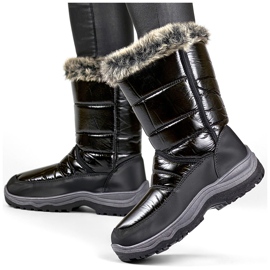 Botas de nieve altas y aislantes de mujer de color negro con pelo negro
