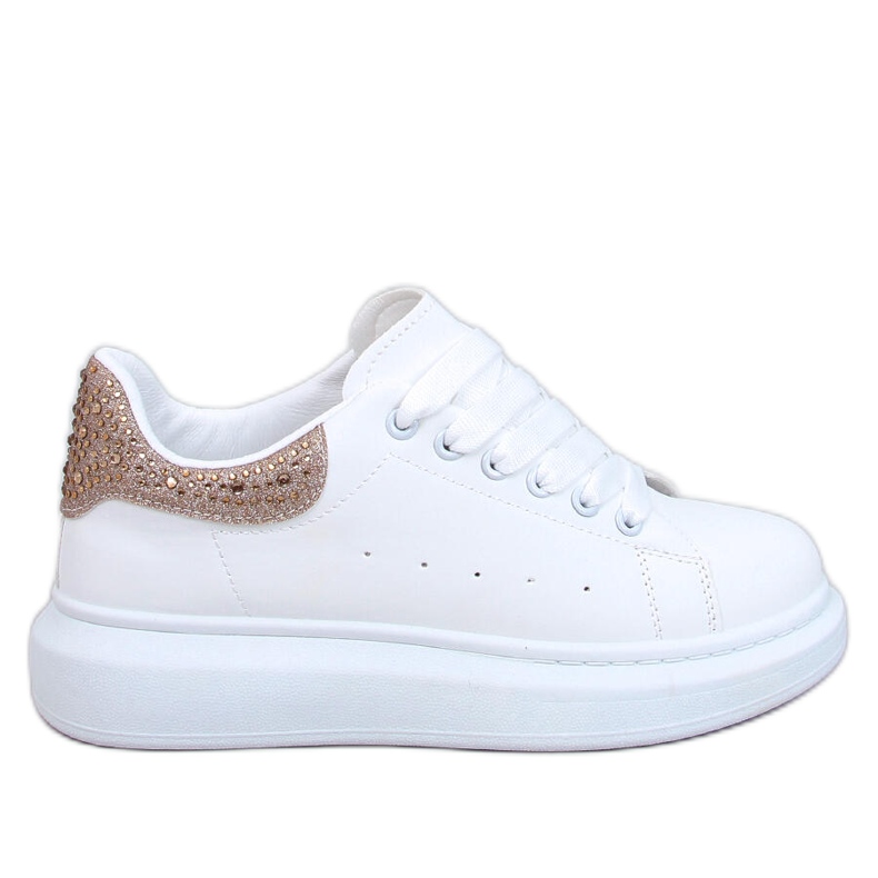 Zapatillas con plataforma blancas y doradas. blanco