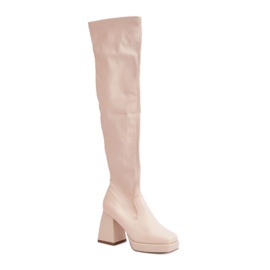 Botas de mujer beige claro con tacones estables.