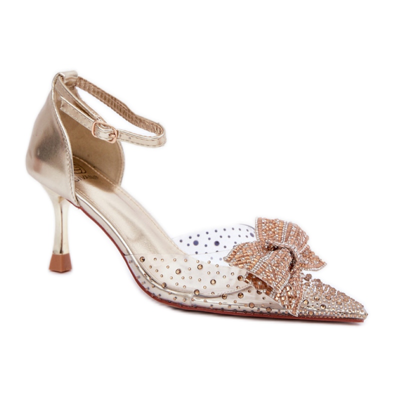 Tacones de mujer decorados con un impresionante lazo dorado