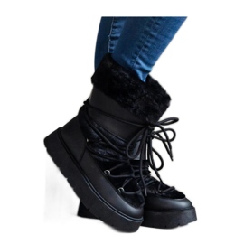 Botas de nieve con cordones y aislamiento negro decoradas con piel