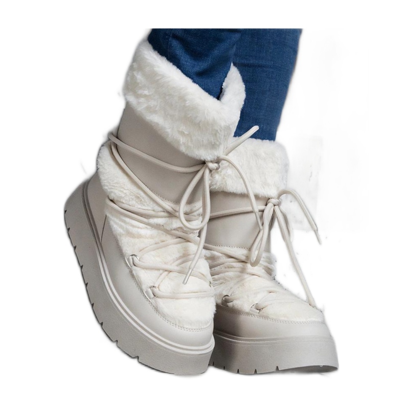 Botas de nieve con cordones y aislamiento beige claro decoradas con pelo de Istiss - Solea