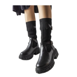 Botas elegantes negras con parte superior elástica. negro