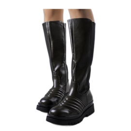 Botas verdes con acolchado.