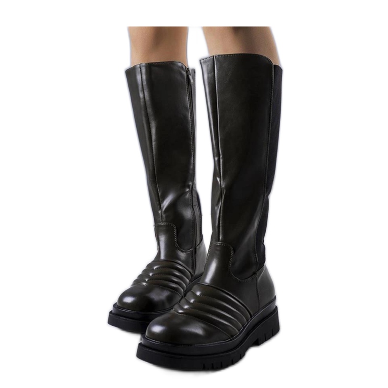 Botas verdes con acolchado.