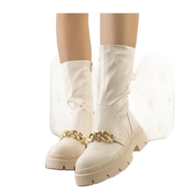 Botas beige con suela alta