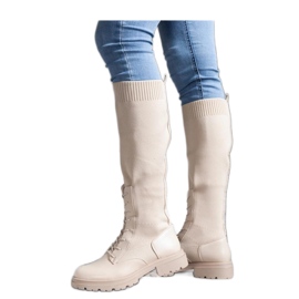 Botas sin cordones beige con parte superior de tela flexible