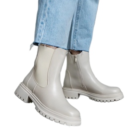 Botines aislantes beige con cremallera, piel ecológica