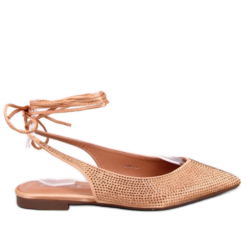 Bailarinas con circones descubiertos en el tacón de oro dorado Bailarinas con circones descubiertos en el tacón de oro dorado