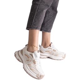 Zapatillas deportivas de mujer blancas. blanco