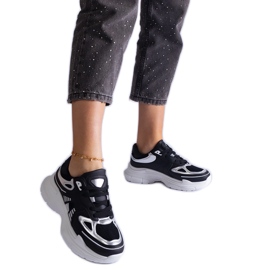 Zapatillas de mujer negras con inserciones plateadas. negro