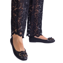 Bailarinas negras decoradas con una flor negro