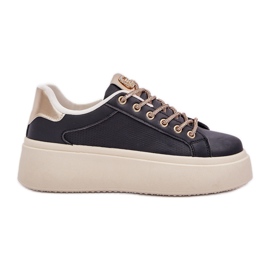 Zapatillas de deporte en una plataforma con cordones decorativos negros