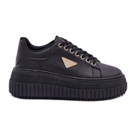 Zapatillas elegantes en una plataforma negra masiva negro