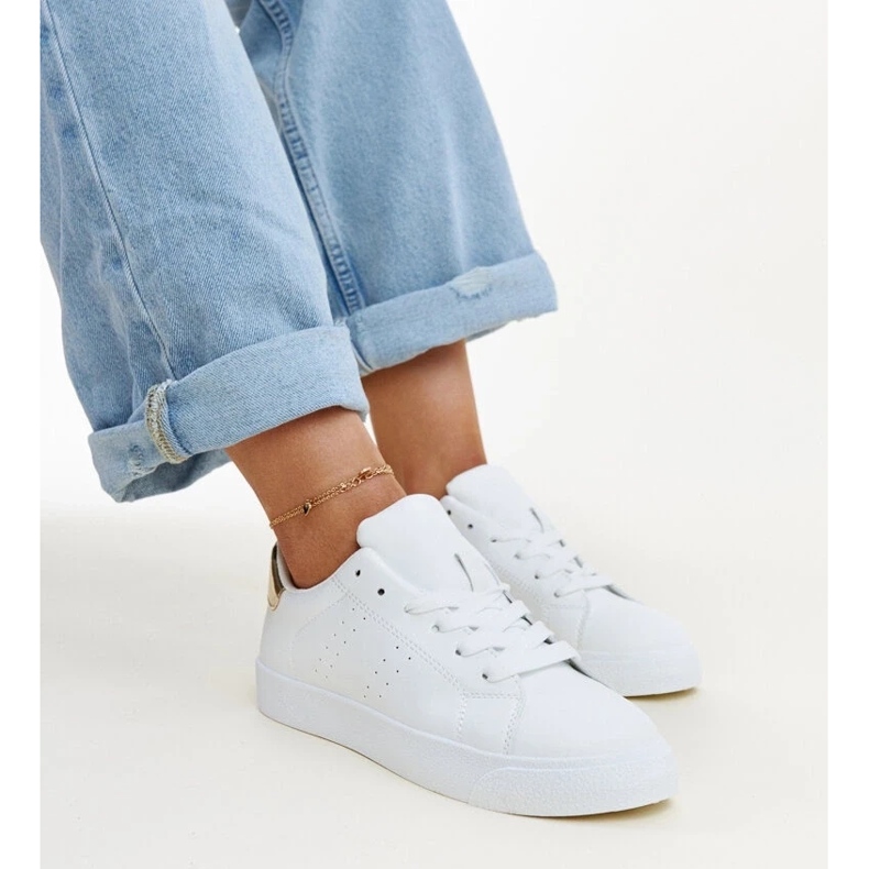 Zapatillas Akila blancas y doradas blanco