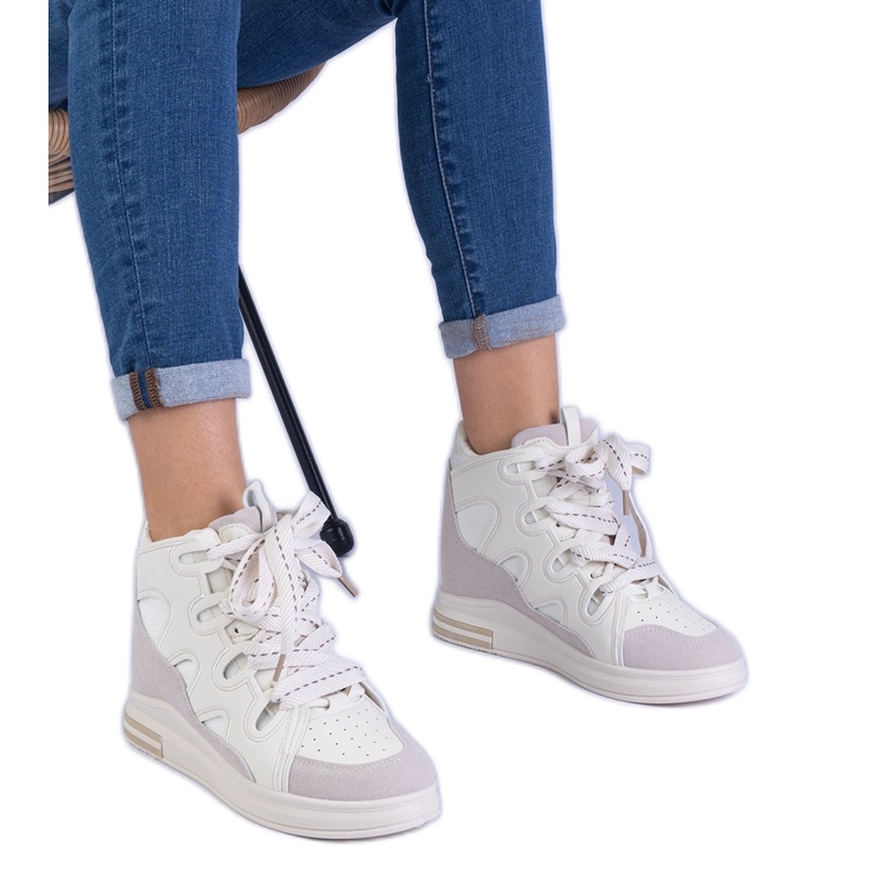 Zapatillas de deporte de mujeres blancas con cordones gruesos blanco