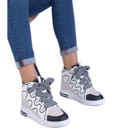 Zapatillas de deporte de mujeres blancas con cordones gruesos blanco