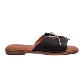Chanclas de suela plana con un arco negro decorativo