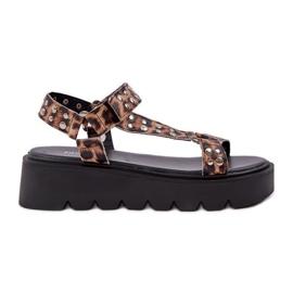 Sandalias decoradas en la plataforma de estampado de leopardo marrón