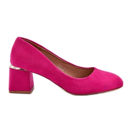 Bombas de gamuza ecológica en el pilar fucsia rosado