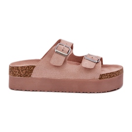Zapatillas para mujeres en una plataforma masiva con hebillas rosadas rosado