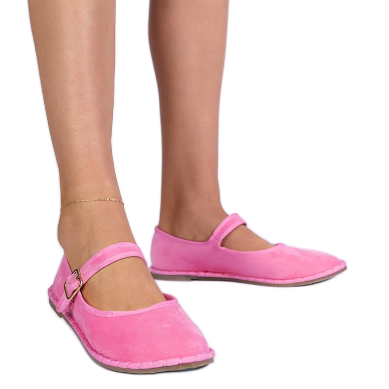 Ballerinas de mujeres rosadas con un cierre rosado