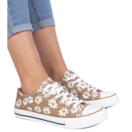 Telas de mujer marrón con flores
