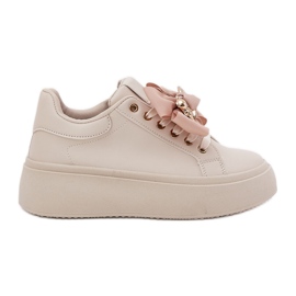 Zapatillas de deporte para mujeres con arco y un broche con un oso de peluche beige Zapatillas de deporte para mujeres con arco y un broche con un oso de peluche beige